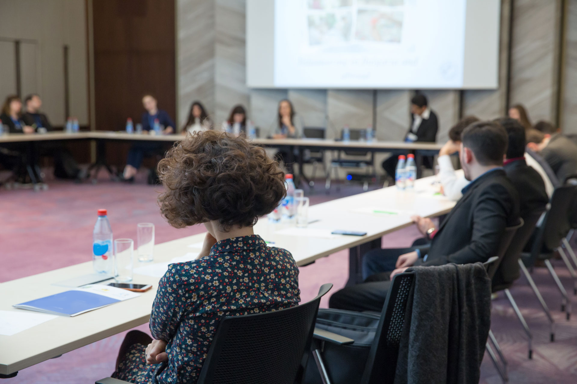 Board Members in the conference hall.