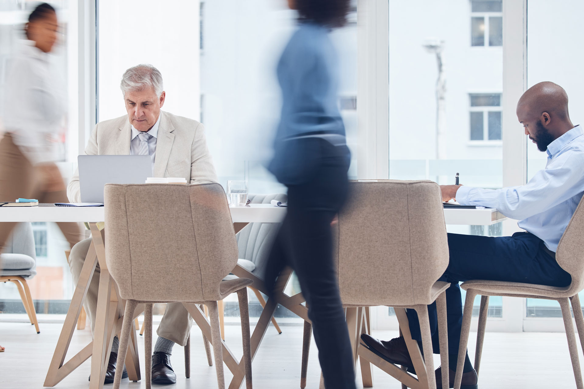 Mission-Vision-Partners-Board-Alignment-Guide busy and motion blur with board members in an office boardroom for planning or strategy